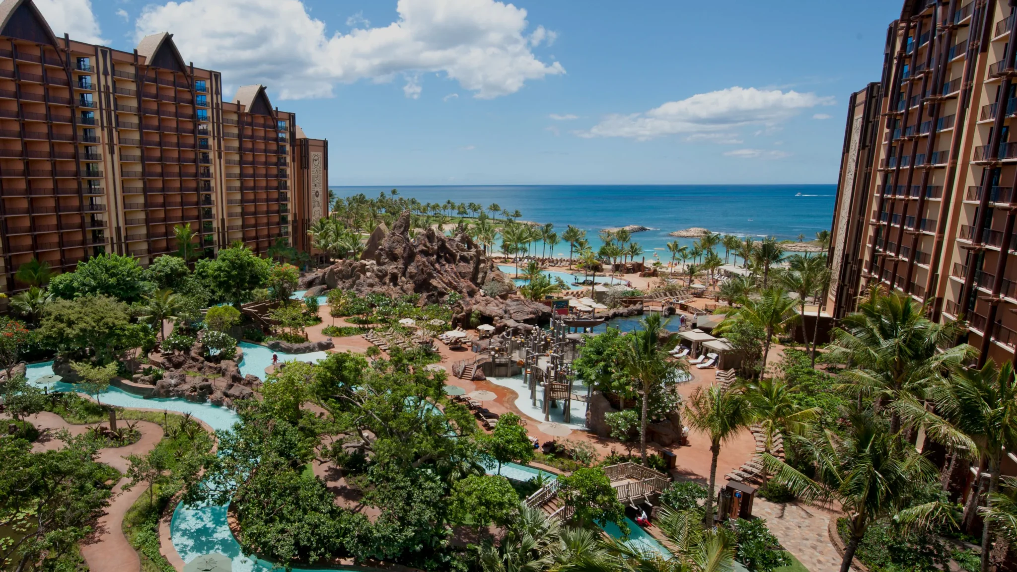 Aulani resort towers and pools at Ko Olina, with the lagoon and the ocean beyond