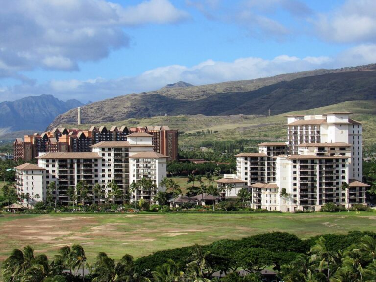 Beach Villas at Ko Olina in the foreground with Aulani behind