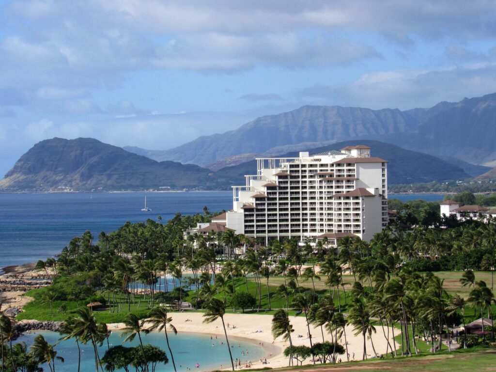 The Four Seasons Oahu tower above the lagoon
