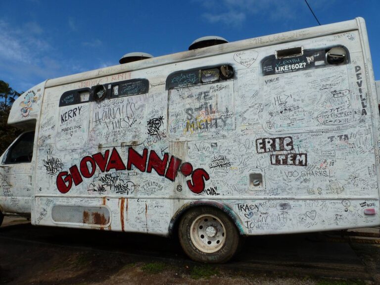 Signatures covering the side of Giovanni's shrimp truck