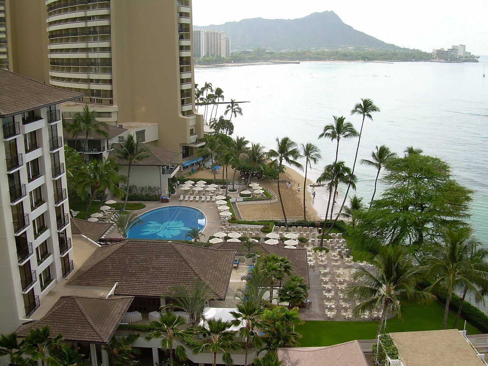 The Halekulani Orchid Pool with Waikiki Beach and Diamond Head beyond