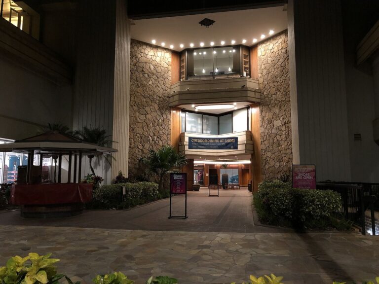 The lit entrance of the Hyatt Regency Waikiki before dawn