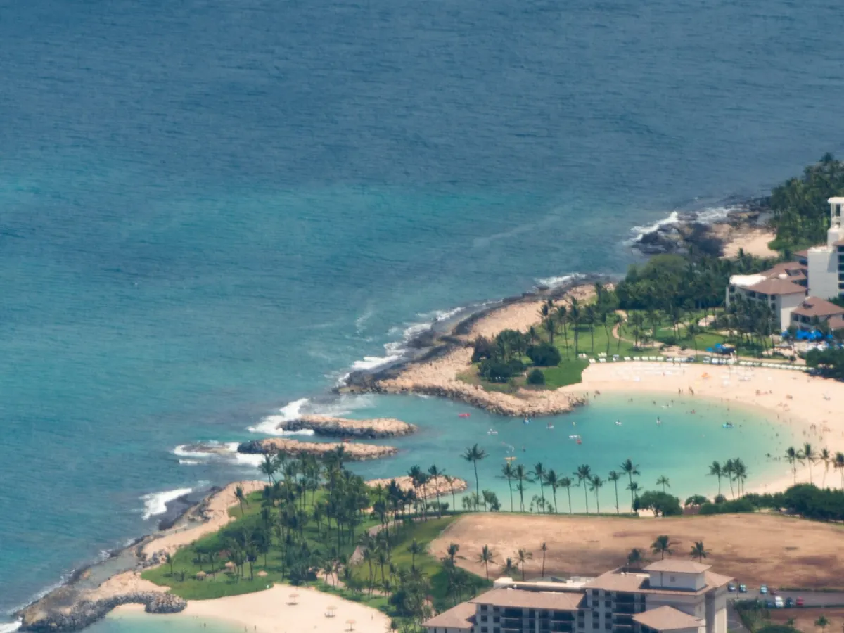 Aerial view of Ko Olina’s Kohola Lagoon, with the resort hotels behind the beach