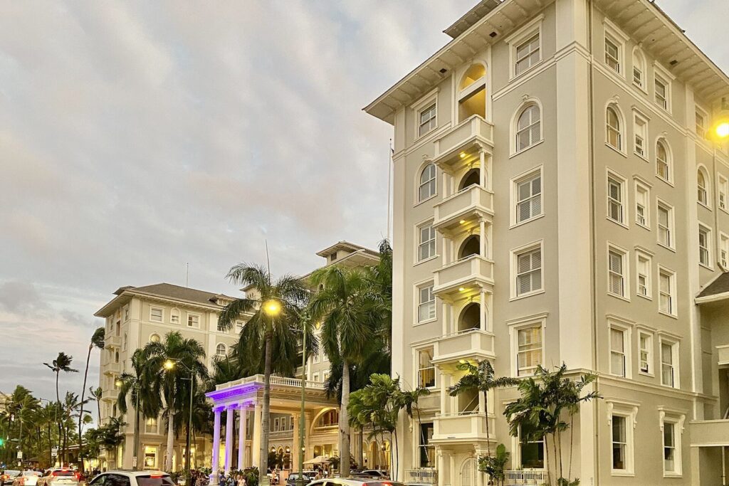 The Moana Surfrider on Kalakaua Avenue at dusk