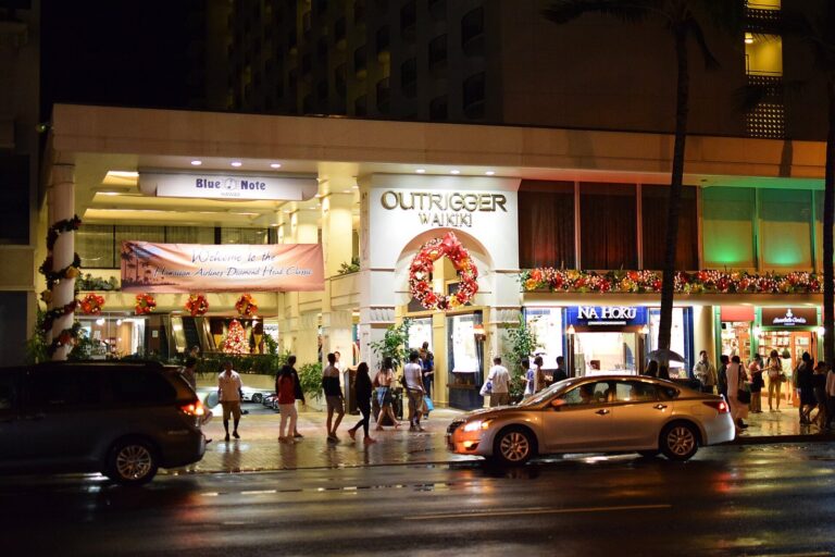 The Outrigger Waikiki entrance on Kalakaua Avenue at night, before the renovation
