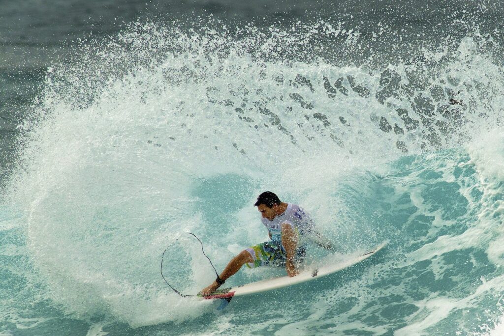 Joel Parkinson turning on a wave during a heat of the 2012 Pipe Masters contest at the Banzai Pipeline