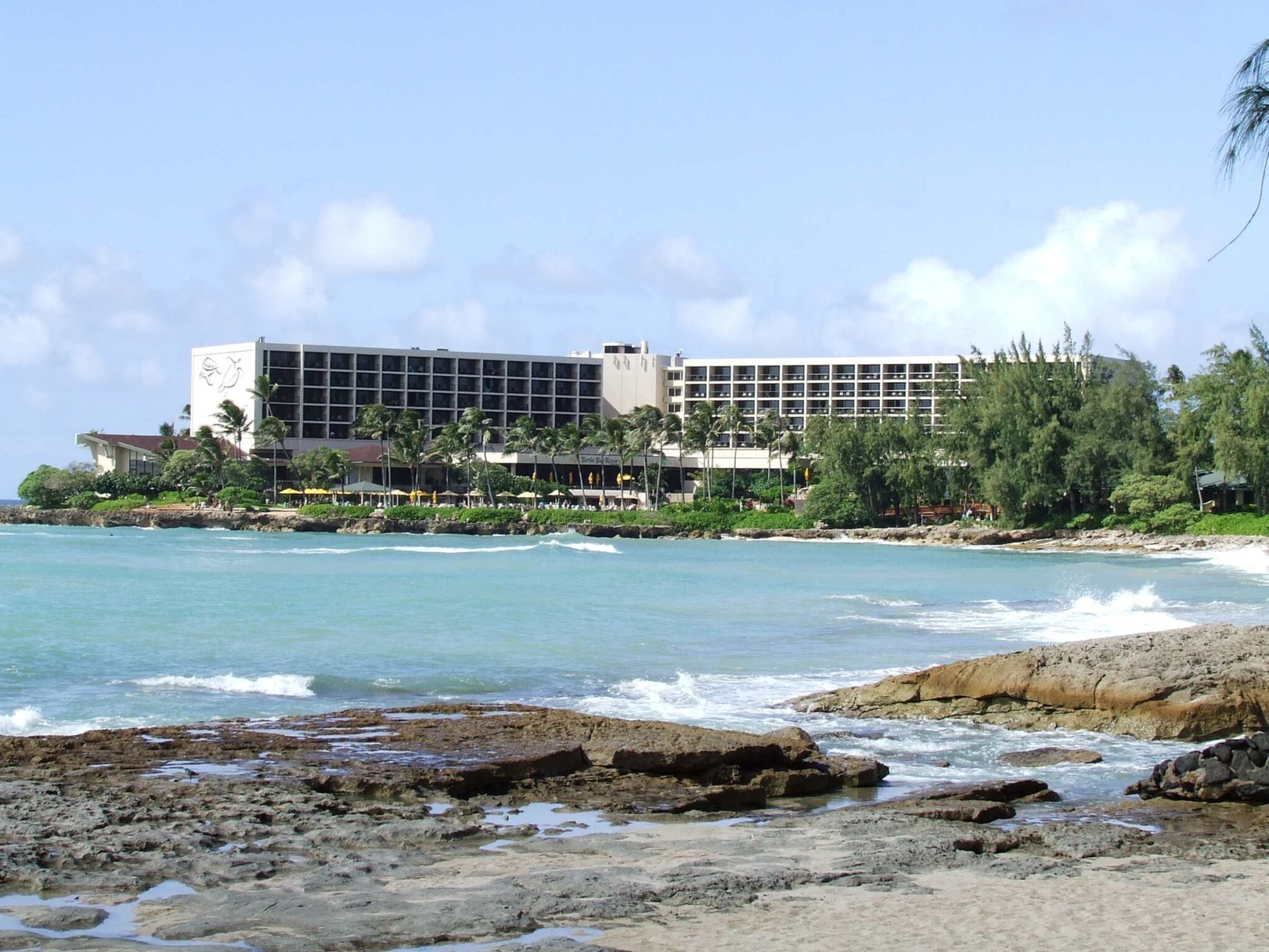 The Turtle Bay resort building on Kuilima Point from the beach