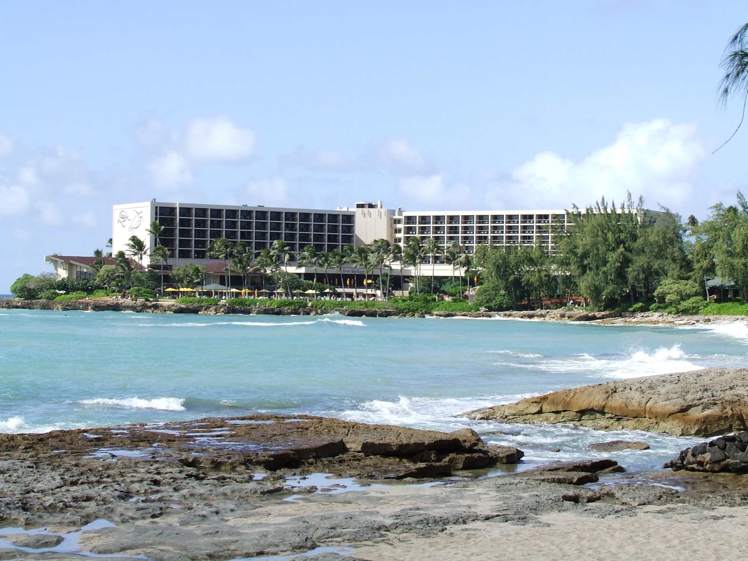 The Turtle Bay resort building on Kuilima Point from the beach