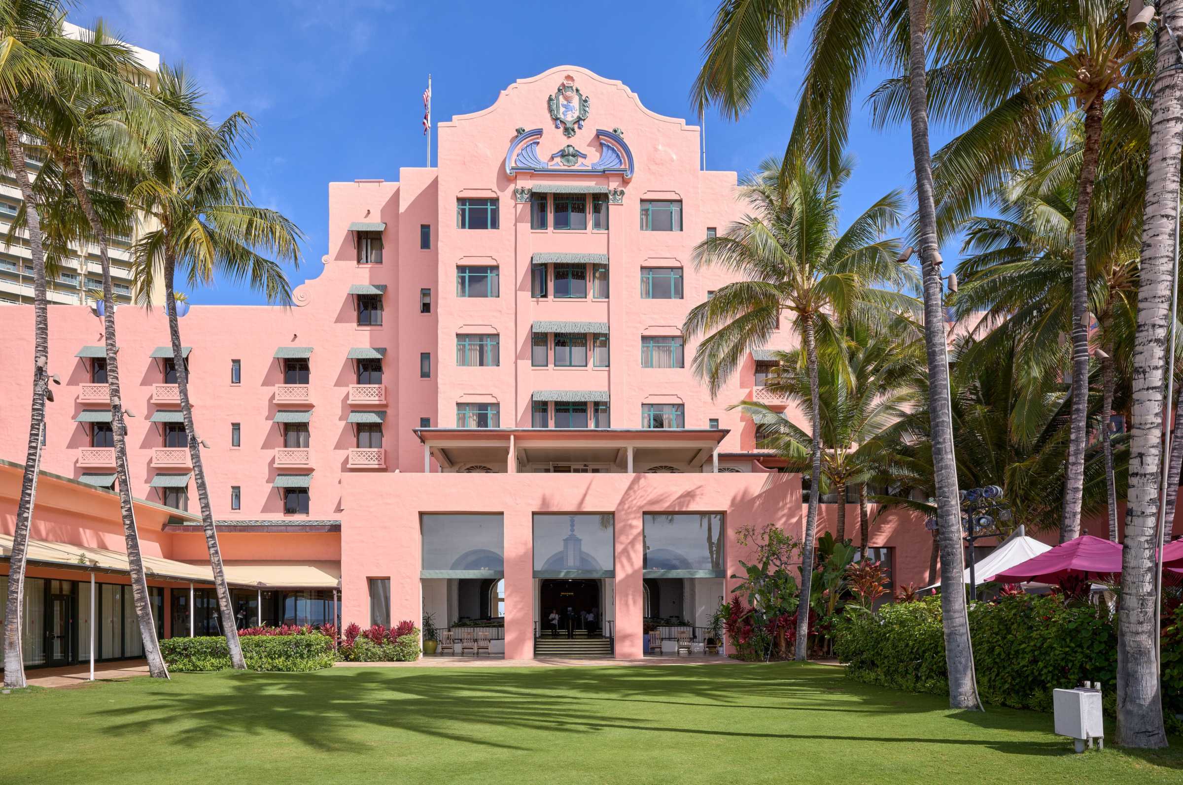 The pink Royal Hawaiian hotel seen from Waikiki Beach