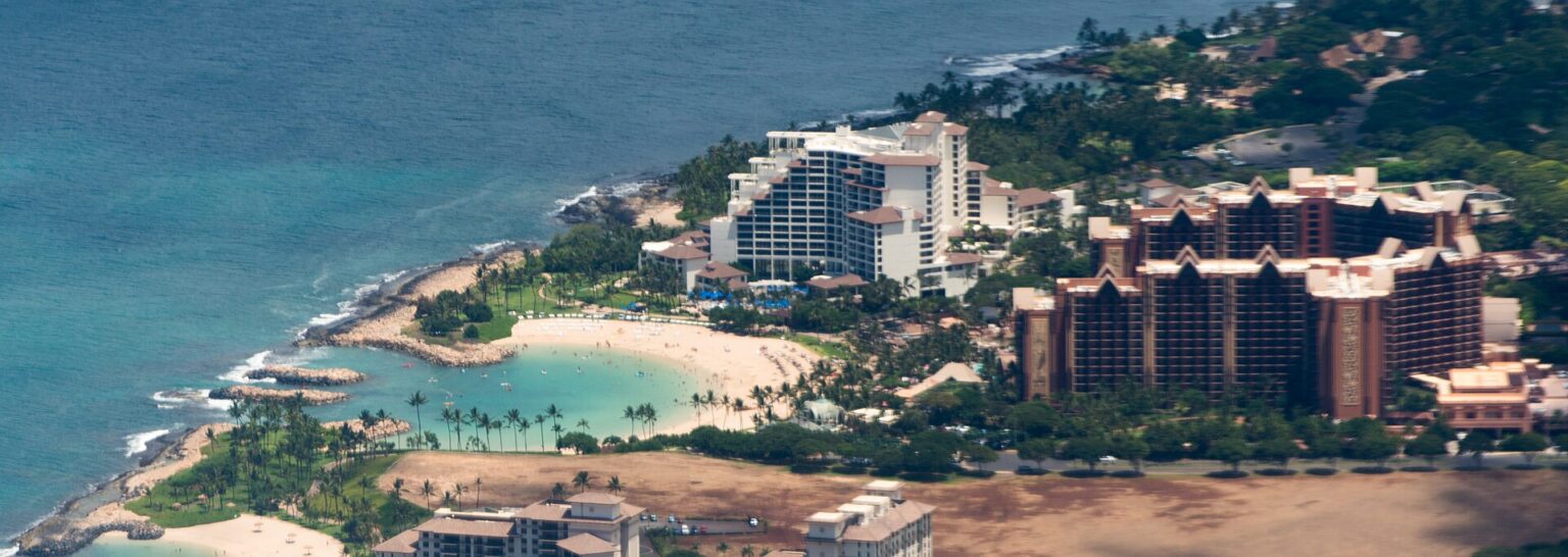 Aerial view of a calm Ko Olina lagoon and beach on Oahu's west side