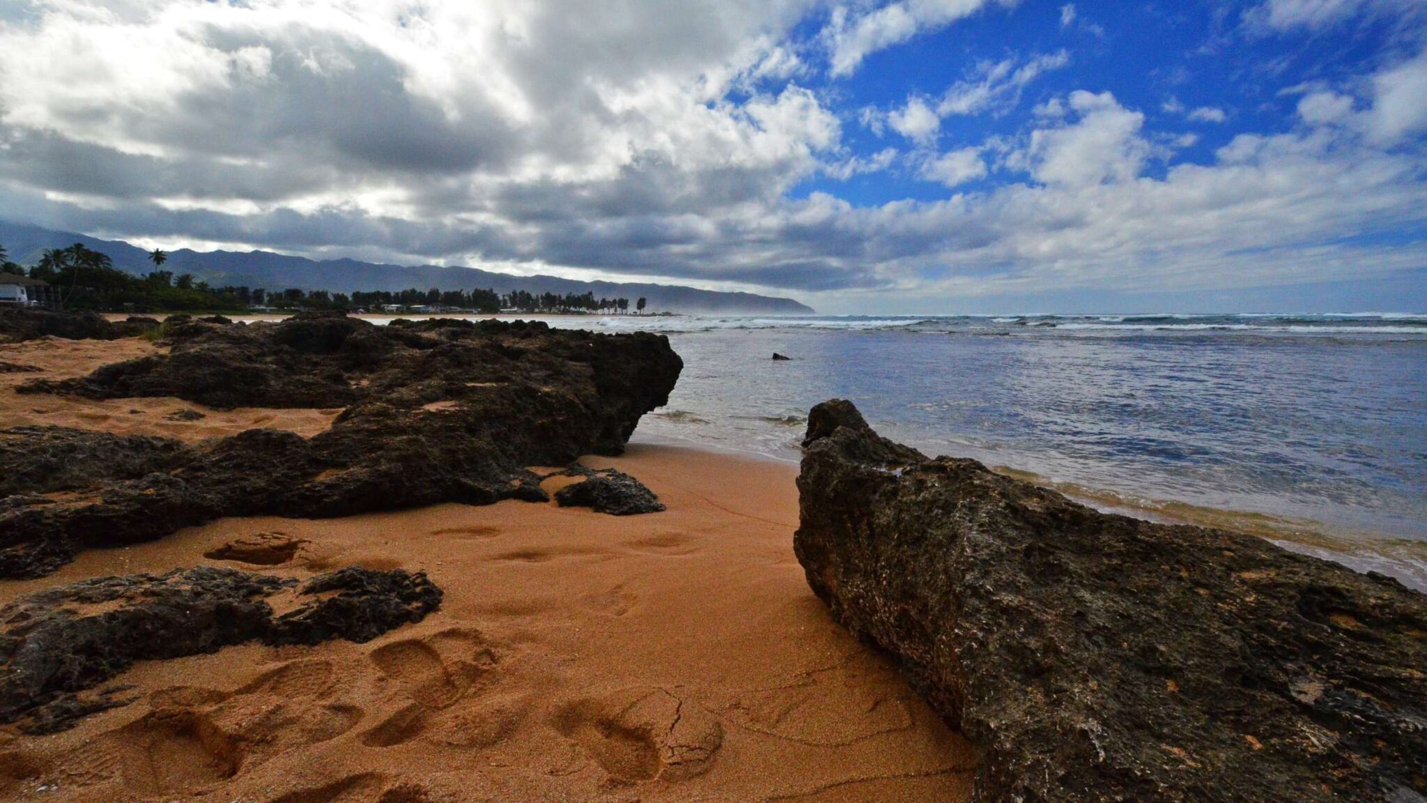Sand, lava rock and the water at Turtle Bay on Oahu's North Shore