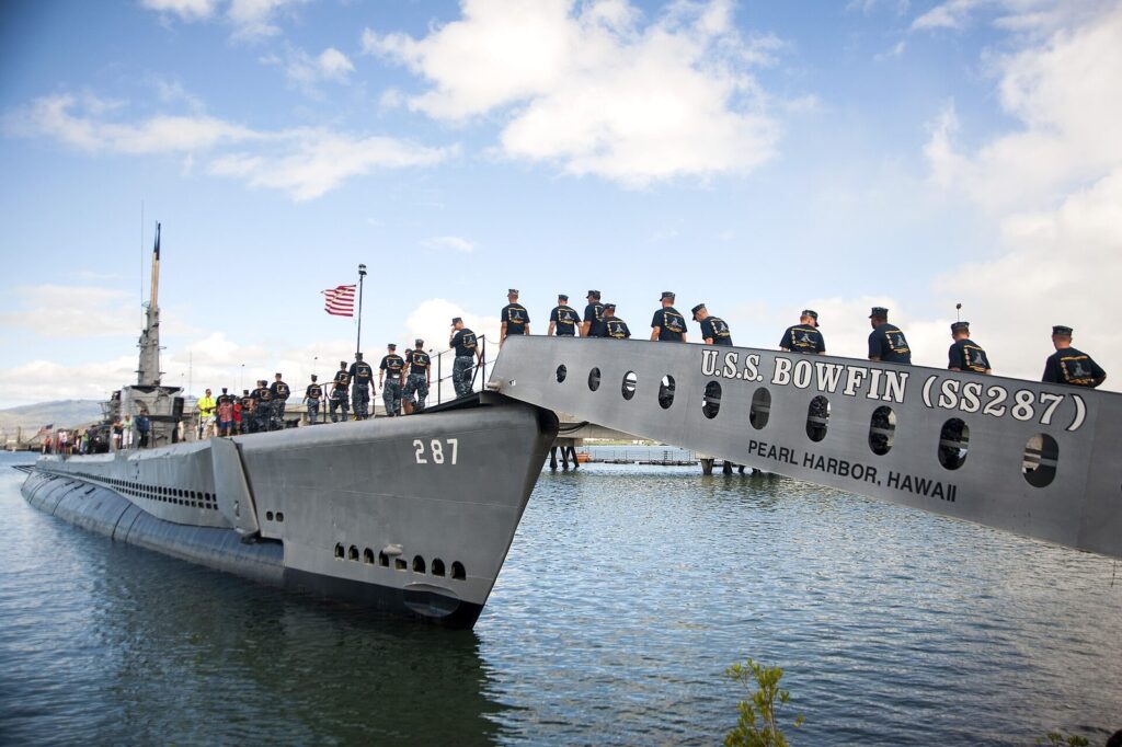 Sailors crossing the gangway onto the USS Bowfin submarine at the Pacific Fleet Submarine Museum, Pearl Harbor