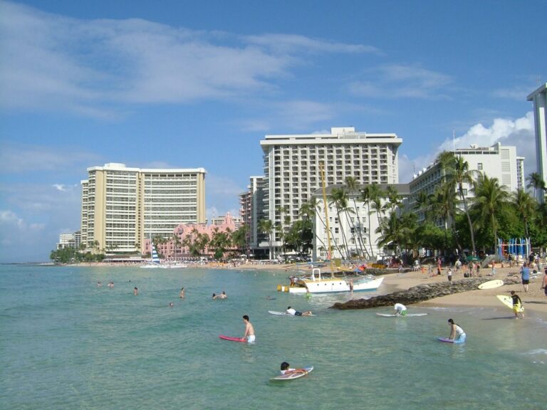 Waikiki Beach with the Moana Surfrider tower behind the surfers
