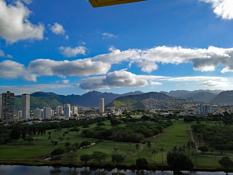 The Ala Wai Canal, golf course and Manoa valley seen from a Waikiki high-rise