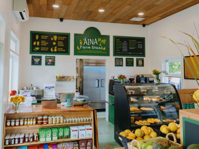 Produce, coffee and local goods on the shelves inside the ʻĀINA Farm Stand in Haleʻiwa
