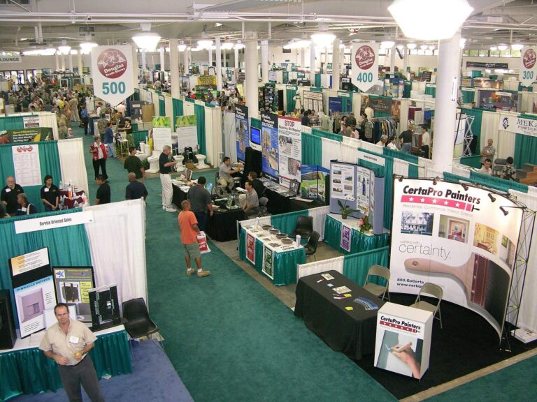 Aisles of booths seen from above inside the Blaisdell Exhibition Hall in Honolulu