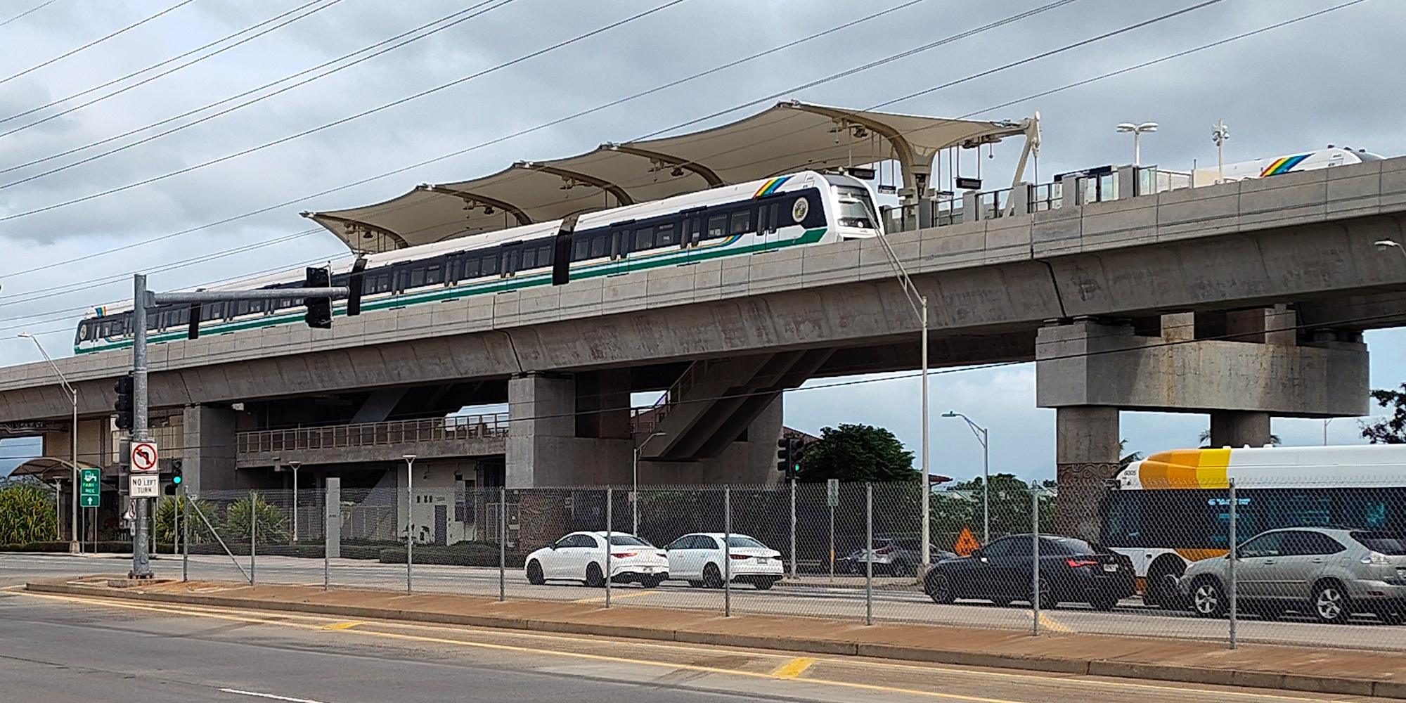 A Skyline train arriving at the elevated Kualakaʻi station in East Kapolei