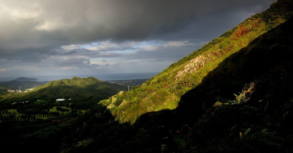Storm clouds and late light on the Koolau cliffs below the Nuuanu Pali Lookout on Oahu